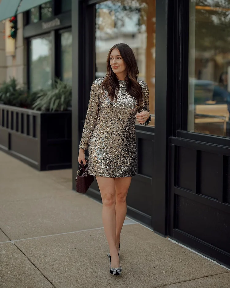 Combine trendy glitter dress with black shoes