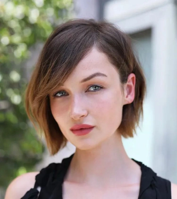 long bangs that frame a square face, side-swept bangs